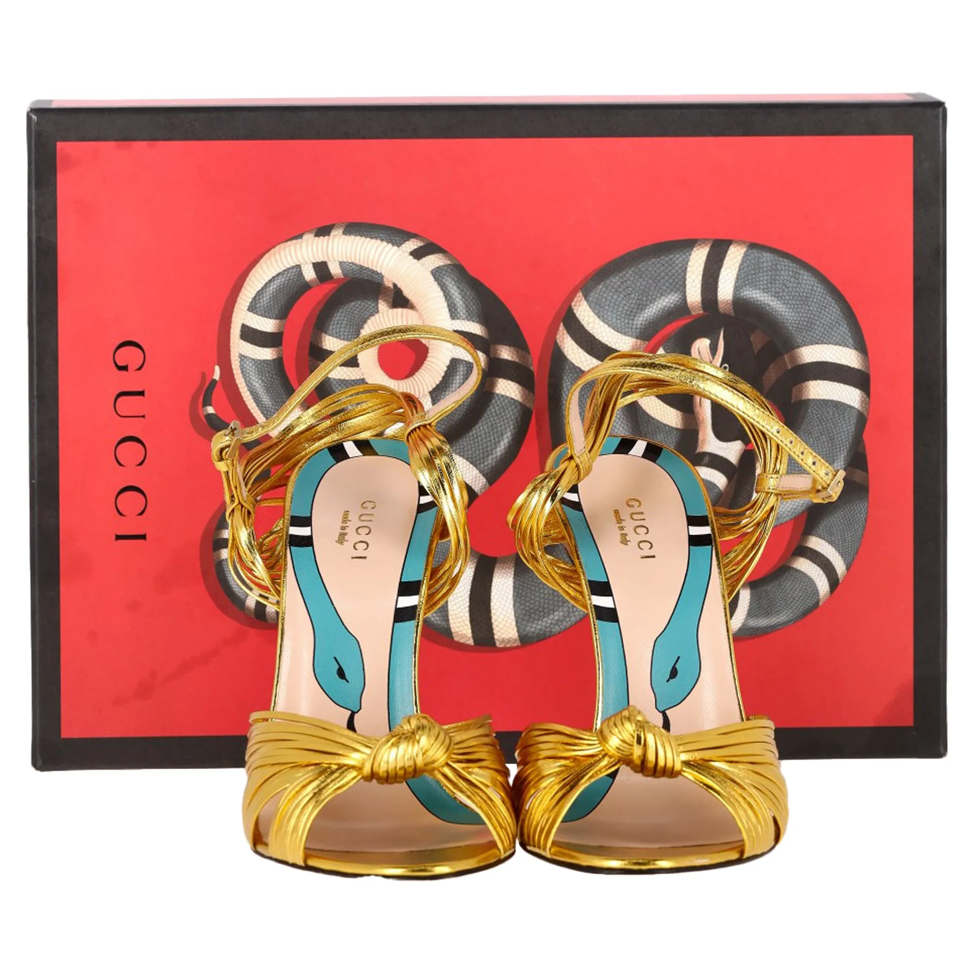 Gucci Strappy Allie Knot Sandals in Gold Leather